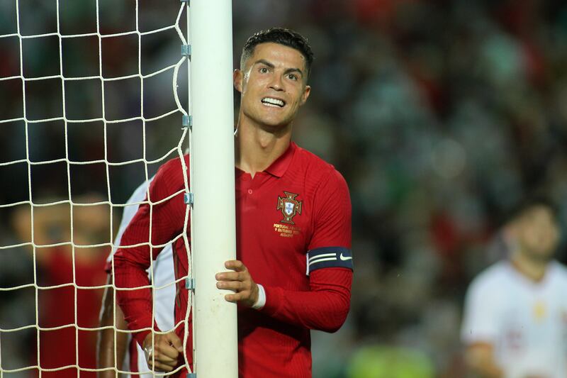 Ronaldo reacts after missing a chance to add to his tally. AP