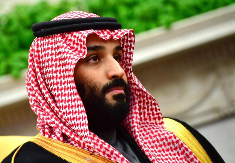 Mohammed bin Salman, Saudi Arabia's crown prince, listens during a meeting with U.S. President Donald Trump, not pictured, in the Oval Office of the White House in Washington, D.C., U.S., on Tuesday, March 20, 2018. The U.S. and Saudi Arabia are developing an increasingly close partnership, encompassing everything from isolating Iran to bolstering business ties beyond energy into technology, defense and entertainment. Photographer: Kevin Dietsch/Pool via Bloomberg