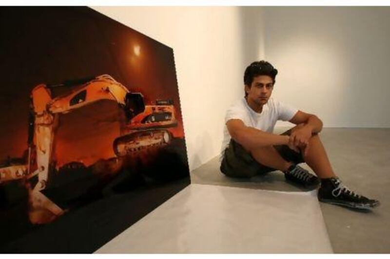 Sami al Turki with one of his work at The Pavilion in Downtown Dubai. Pawan Singh / The National