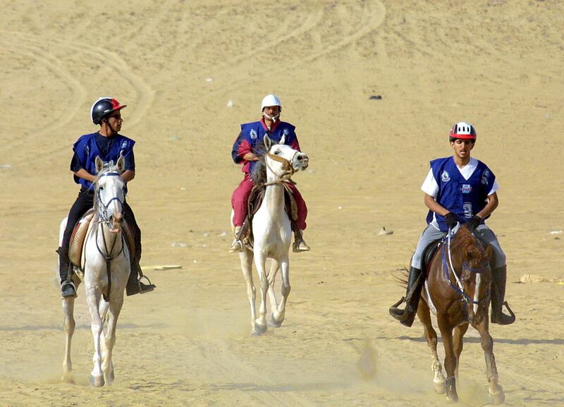 Sheikh Rashid bin Mohammed, right, who died in 2015, finished third in the race.