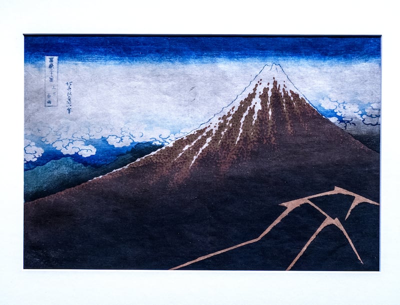 'Storm Below the Summit' by Katsushika Hokusai.