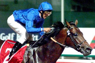 Jockey Frankie Dettori rides Dubai Millennium to the win at the fifth Dubai World Cup in 2000, in a record time of 1min 59.50secs. AFP