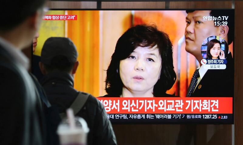 People watch a TV screen showing file footage of North Korean Vice Foreign Minister Choe Son Hui during a news program at the Seoul Railway Station in Seoul, South Korea, Friday, March 15, 2019. North Korean leader Kim Jong Un will soon decide whether to continue diplomatic talks and maintain his moratorium on missile launches and nuclear tests, Choe said Friday, adding that the U.S. threw away a golden opportunity at the recent summit between their leaders. The Korean letters on the screen read: " A press conference of diplomats and foreign media in Pyongyang." (AP Photo/Ahn Young-joon)