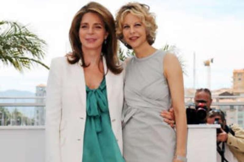 Queen Noor of Jordan (left) and the actress Meg Ryan at the Cannes Film Festival last month, making the point that this summer is about simple lines and muted tones, with the occasional splash of colour.