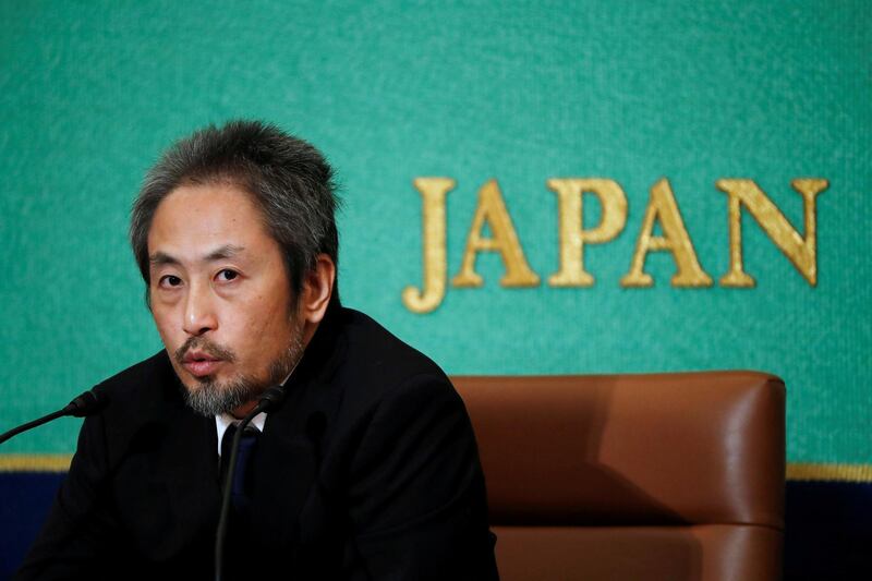Jumpei Yasuda, the Japanese journalist held in Syria for more than three years, addresses a press conference for the first time since his release last month, at the Japan National Press Club in Tokyo, Japan. REUTERS