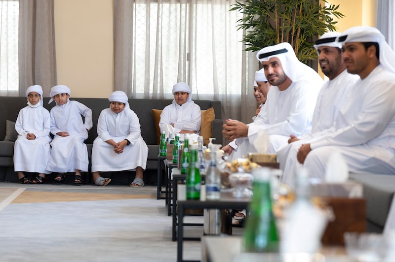 Guests attend a reception at the home of Dr Omar Habtoor Al Derei, Director General of the UAE Fatwa Council (not shown).