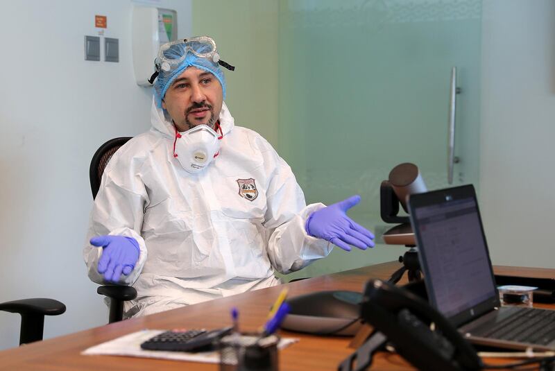 DUBAI, UNITED ARAB EMIRATES , April 26– 2020 :- Dr. Adel Alsisi, Consultant Critical Care Medicine, Chief Medical Officer, Prime Hospital wearing PPE kit during the interview at the Prime Hospital on airport road in Al Garhoud in Dubai . (Pawan Singh / The National) For News/Standalone/Online/Instagram/Stock.  Story by Nick Webster