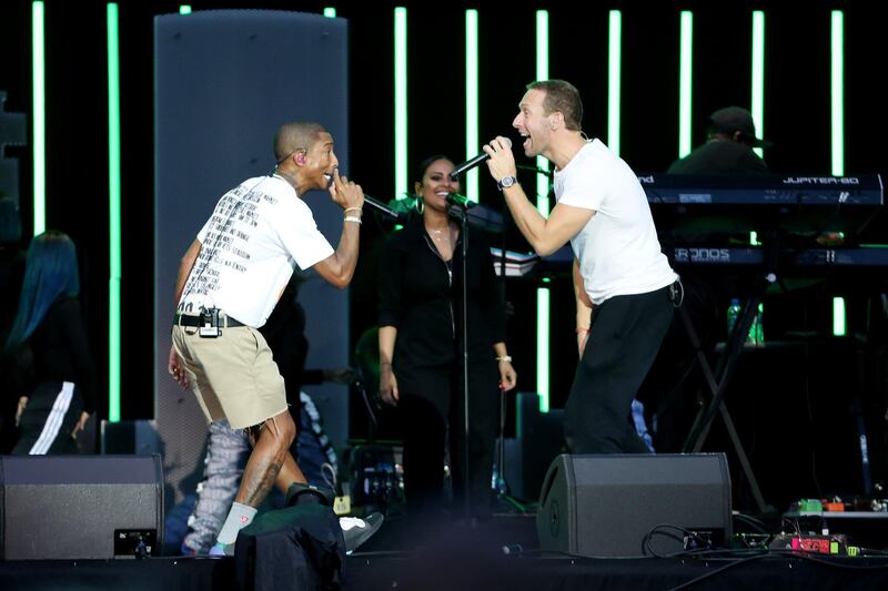Pharrell Williams and Chris Martin perform a duet at the FNB Stadium. Getty