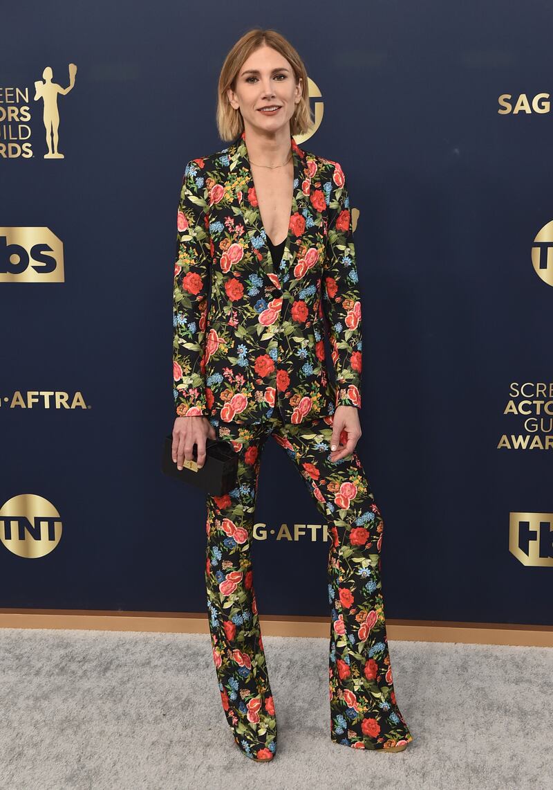 Jennifer Landon arrives in a floral suit. AP