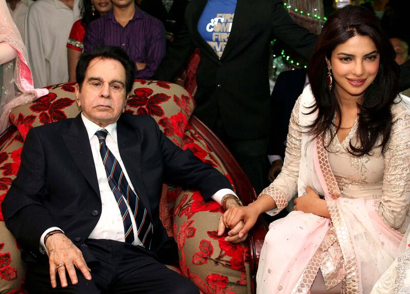 Dilip Kumar with actress Priyanka Chopra during his 89th birthday celebrations in Mumbai on December 11, 2011.