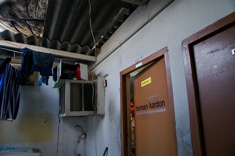 In some accommodation in Al Satwa area in 2008, many rooms had no windows, with a single light bulb as the only source of light, yet air conditioning was available in most units. Getty Images