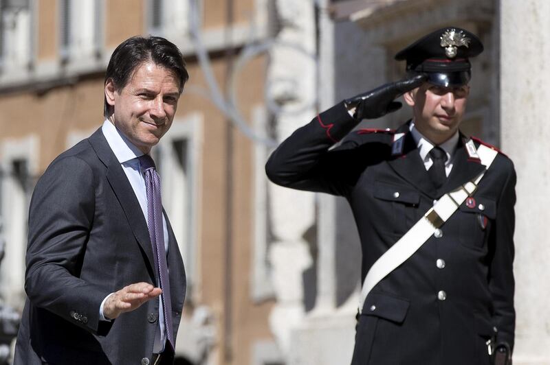 epa06759296 Designated Italian Prime Minister Giuseppe Conte arrives at the Lower House in Rome, Italy, 24 May 2018. Conte is holding a round of consultations with Italy's political parties at the Lower House on 24 May, after getting a mandate from President Sergio Mattarella on 23 May, to form a government.  EPA/ANGELO CARCONI