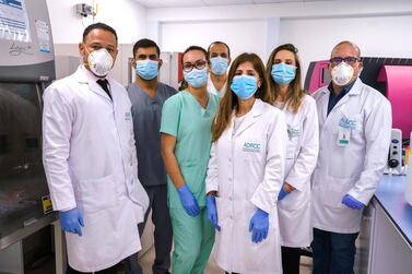 Dr Yendry Ventura, general manager of ADSCC and Abu Dhabi bone marrow transplant programme director, with fellow staff members.