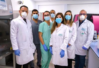 Dr Yendry Ventura, general manager of ADSCC and Abu Dhabi bone marrow transplant programme director, with fellow staff members.