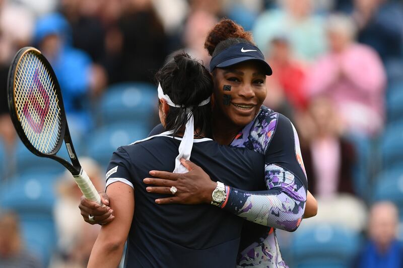 Serena Williams embraces Ons Jabeur of Tunisia after her doubles win in Eastbourne. Getty