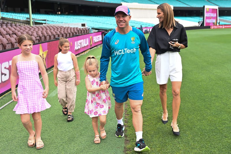 Australia batsman David Warner with his family ahead of the third Test against Pakistan at the Sydney Cricket Ground. AFP