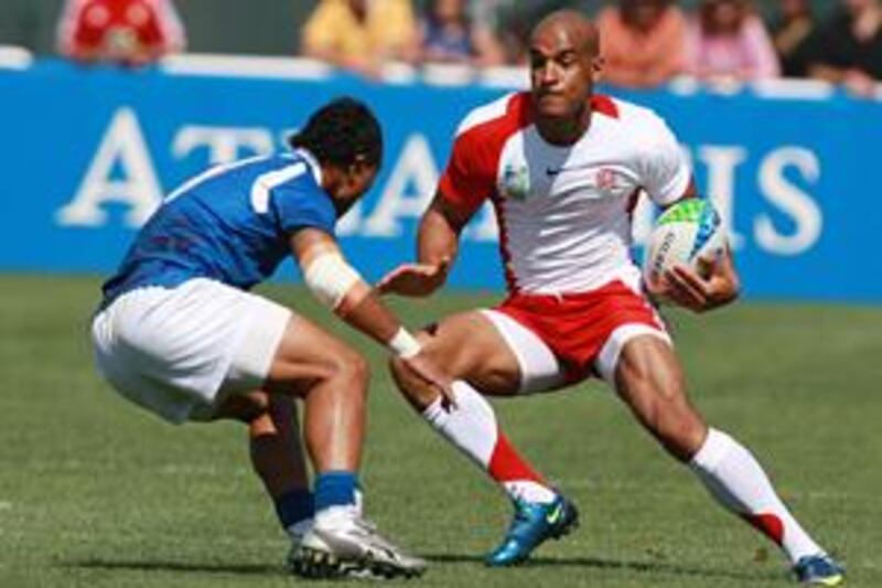 The pace and agility of Tom Varndell, right, was too hot to handle for his opponents at the World Cup Sevens in Dubai.