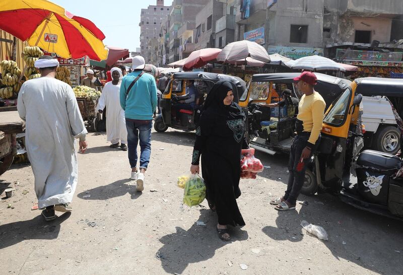 Egyptians at a local market in the Bolaq district in Giza, Egypt.  EPA