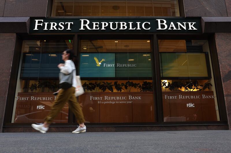 A pedestrian walks by a First Republic bank in San Francisco, California. AFP