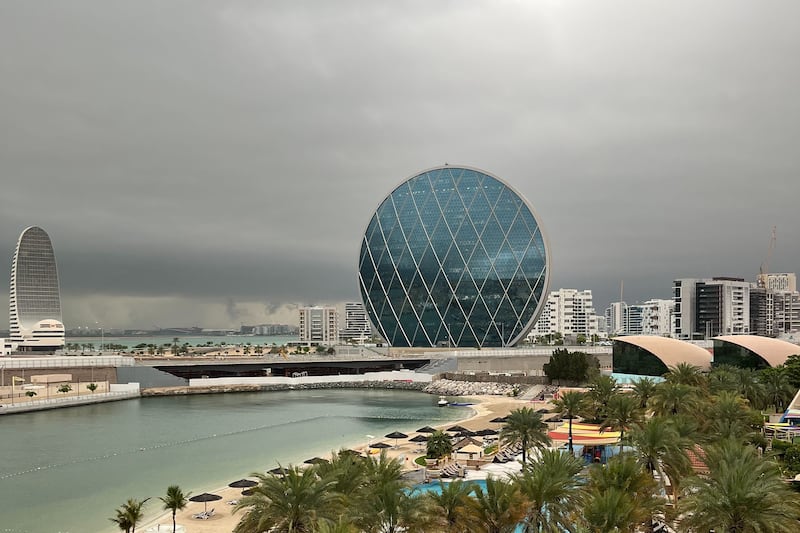 Dark clouds over Aldar headquarters in Al Raha, Abu Dhabi. Evelyn Lau / The National