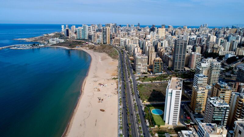 epa08819663 A picture taken with a drone shows empty roads during nationwide COVID-19 coronavirus pandemic lockdown at Ramlet al-Bayda seaside in Beirut, Lebanon, 14 November 2020. Lebanese authorities imposed a curfew on 10 November from 5:00 pm until 5:00 am for a lockdown of 17 days from 14 until 30 November 2020 due to the rise of Covid-19 Coronavirus cases in the country in an effort to curb the spread of coronavirus. Exempted from the closure are Beirut International Airport, the land and sea borders, supermarkets, bakeries, pharmacies, and government institutions that provide services to citizens, doctors, and press.  EPA/WAEL HAMZEH