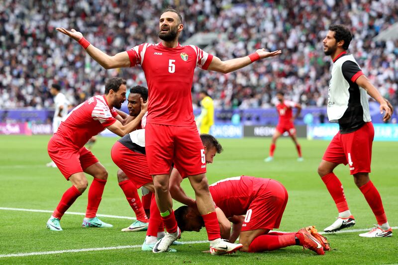 Yazan Al Arab of Jordan celebrates scoring his team's second goal. Getty Images