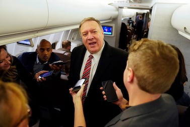 US Secretary of State Mike Pompeo speaks to reporters aboard his plane en route to London, Britain, January 29, 2020. Pompeo is on a foreign trip to eastern Europe and Central Asia. / AFP / POOL / KEVIN LAMARQUE