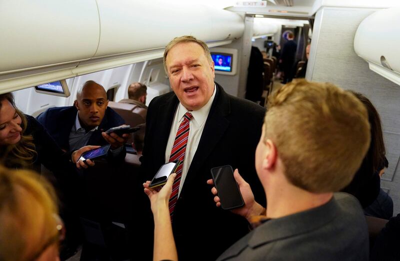 US Secretary of State Mike Pompeo speaks to reporters aboard his plane en route to London, Britain, January 29, 2020.  Pompeo is on a foreign trip to eastern Europe and Central Asia.  / AFP / POOL / KEVIN LAMARQUE
