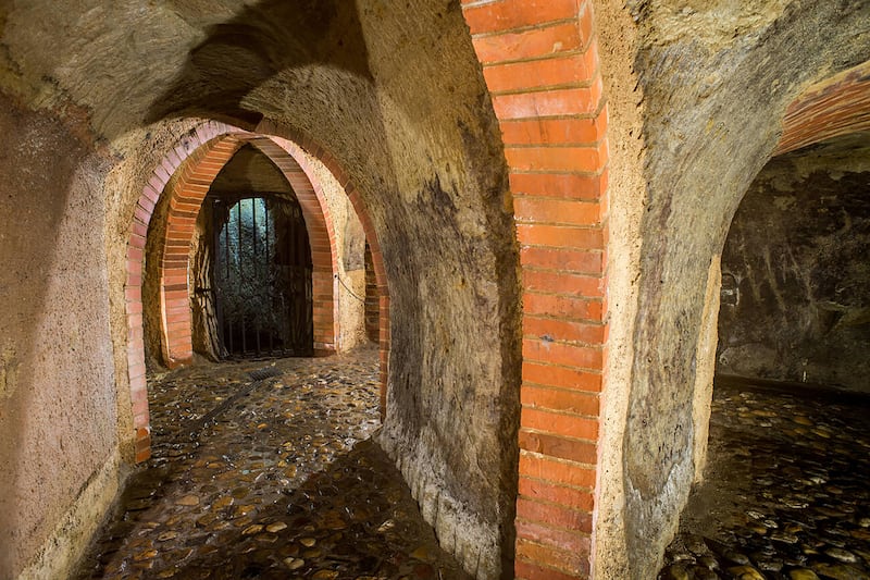 Part of the Pilsen Historical Underground tunnels in the Czech Republic, which started construction in the 13th century. Alamy