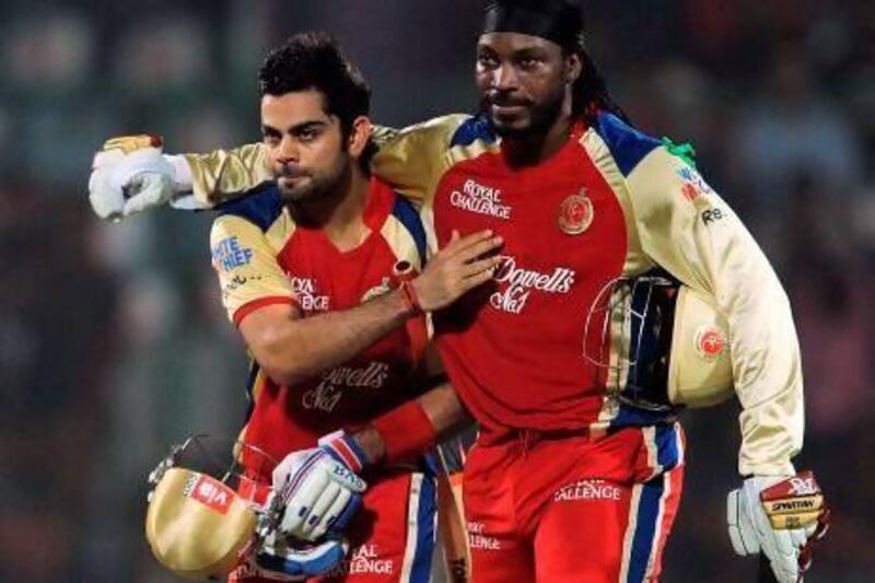 Virat Kohli, left, and Chris Gayle, right, pictured in action in the 2012 IPL season, were Bangalore's heroes in their win over Chennai.