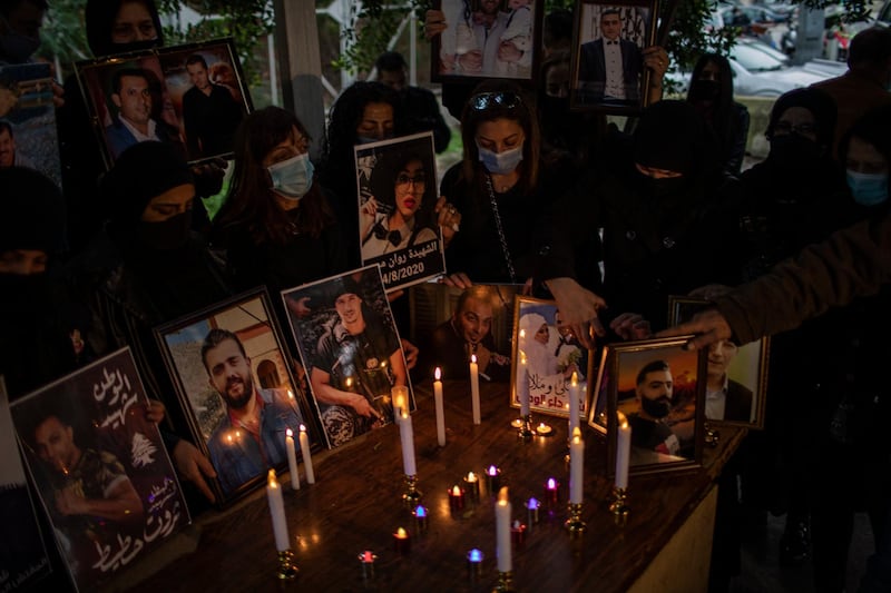 Family members hold a vigil for victims of the Beirut port blast in the Lebanese capital. Getty Images