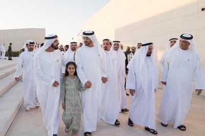 ABU DHABI, UNITED ARAB EMIRATES - November 30, 2017: HH Sheikh Mohamed bin Rashid Al Maktoum, Vice-President, Prime Minister of the UAE, Ruler of Dubai and Minister of Defence (L), HH Sheikha Fatima bint Mohamed bin Hamad bin Tahnoon Al Nahyan (2nd L), HH Sheikh Mohamed bin Zayed Al Nahyan, Crown Prince of Abu Dhabi and Deputy Supreme Commander of the UAE Armed Forces (3rd L), HH Sheikh Humaid bin Rashid Al Nuaimi, UAE Supreme Council Member and Ruler of Ajman (4th L), HH Dr Sheikh Sultan bin Mohamed Al Qasimi, UAE Supreme Council Member and Ruler of Sharjah (2nd R) and HH Sheikh Saud bin Saqr Al Qasimi, UAE Supreme Council Member and Ruler of Ras Al Khaimah (R), attend a Commemoration Day ceremony at Wahat Al Karama, a memorial dedicated to the memory of UAE’s National Heroes in honour of their sacrifice and in recognition of their heroism.
( Mohamed Al Hammadi / Crown Prince Court - Abu Dhabi )
---