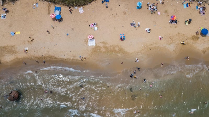 A picture taken by drone shows Turkish people enjoying Kisirkaya Beach in the Black Sea, in Istanbul, Turkey.  EPA