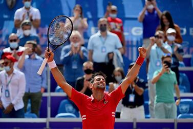 Serbia's tennis player Novak Djokovic celebrates after winning the final match against Slovakia Alex Molcan at the Belgrade Open tennis tournament in Belgrade on May 29, 2021. / AFP / Andrej ISAKOVIC