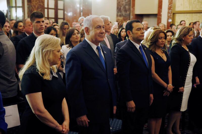 Israeli Prime Minister Benjamin Netanyahu (2L) stands next to Guatemalan President Jimmy Morales during a reception for the dedication ceremony of the embassy of Guatemala in Jerusalem, at the King David hotel in Jerusalem, May 16, 2018. REUTERS/Baz Ratner