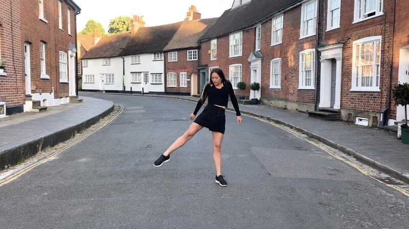 Royal Ballet dancer Tierney Heap performs in a street in St Albans, north London. Reuters