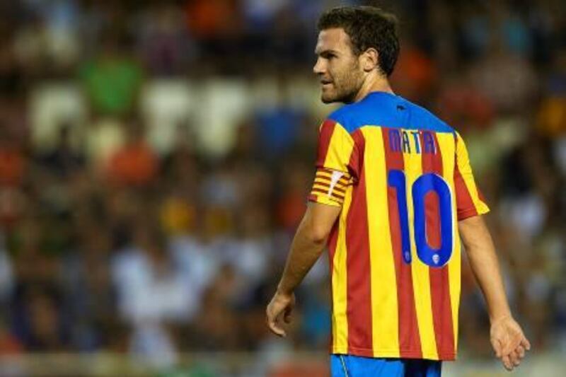 VALENCIA, SPAIN - AUGUST 12:  Juan Mata of Valencia looks on during the Orange Trophy match between Valencia and Roma at Estadio Mestalla on August 12, 2011 in Valencia, Spain.  (Photo by Manuel Queimadelos Alonso/Getty Images)