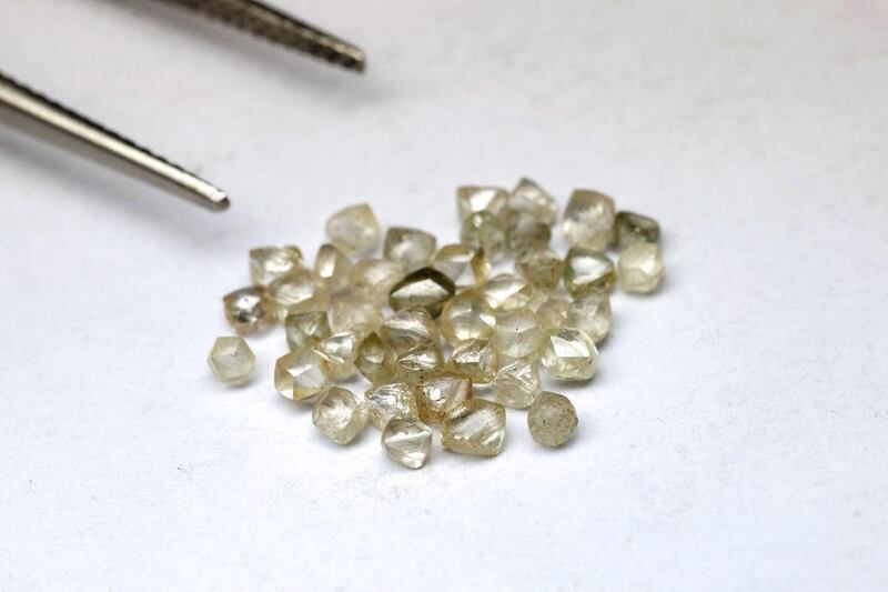 Above, rough diamonds on a trader's desk in Venezuela. kimberly Process head Ahmed bin Sulayem has led initiatives to bring some diamond producers, such as Venezuela and the Central African Republic, back into the diamond-trading community. Jorge Silva / Reuters