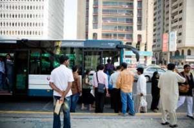 Abu Dhabi - September 30, 2009:  The new MAN buses on the Electra Street route. The new buses have been introduced for the f1 race and will then be used to support the city bus system. Lauren Lancaster / The National *** Local Caption ***  30.09.09 - New Man Bus123.jpg