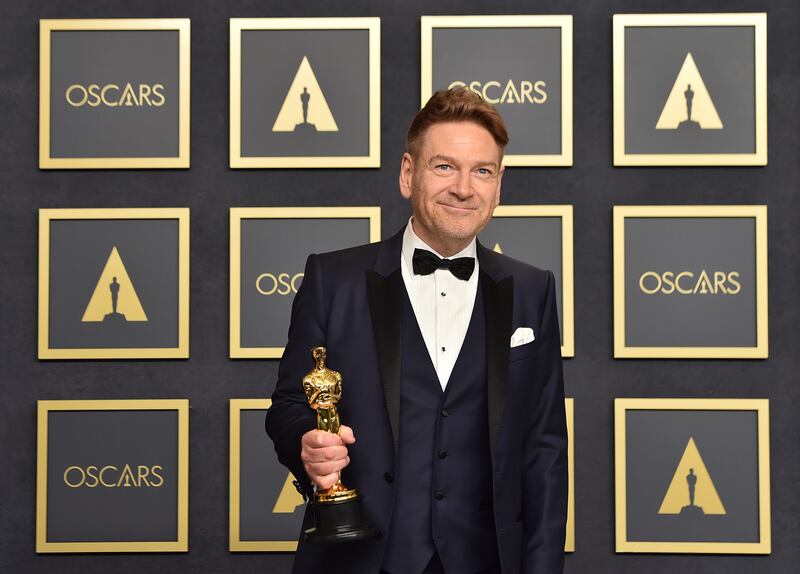 Kenneth Branagh, winner of Best Original Screenplay for 'Belfast', poses in the press room at the Oscars, at the Dolby Theatre in Los Angeles. AP