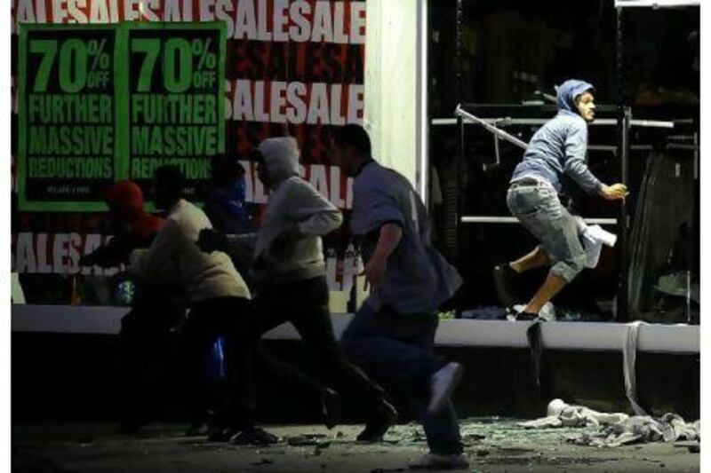 Peckham in south London was one of several suburbs that was looted by mobs in the British capital on Monday.