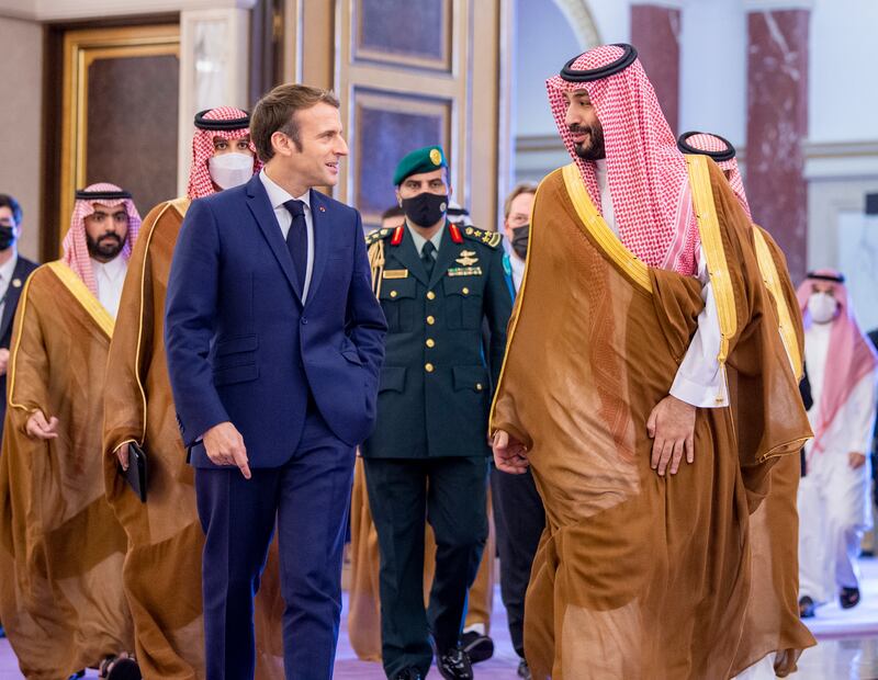 Mr Macron arrived in Saudi Arabia after visiting the UAE. EPA