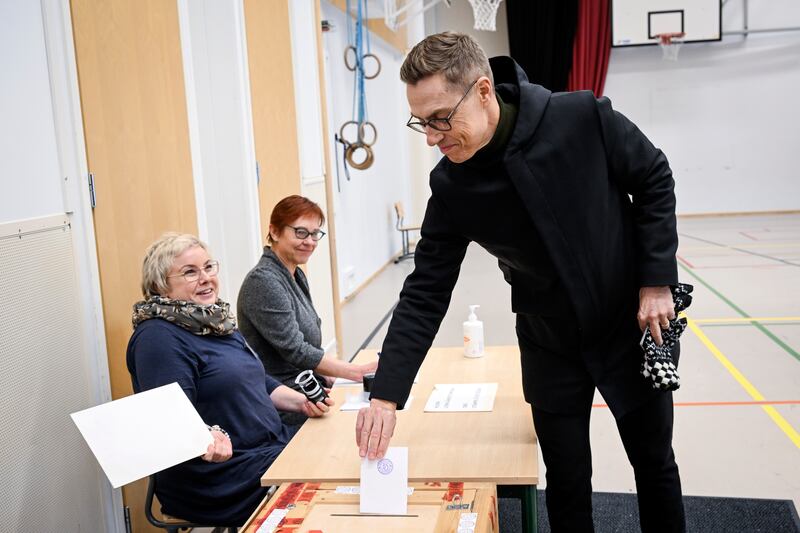 Mr Stubb casts his ballot at a polling station on January 28. EPA