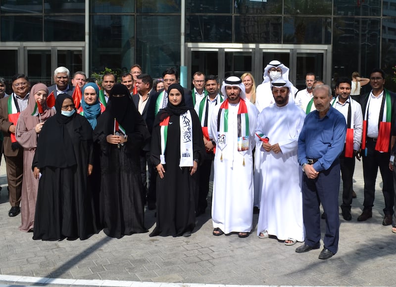 Federal Authority For Government Human Resources members of staff at the UAE flag day celebrations.