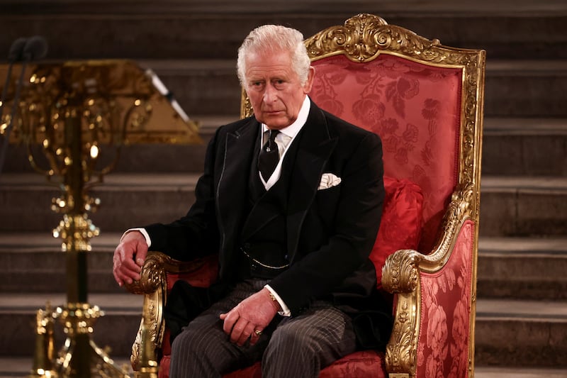 The king observes proceedings from his seat at Westminster Hall. PA