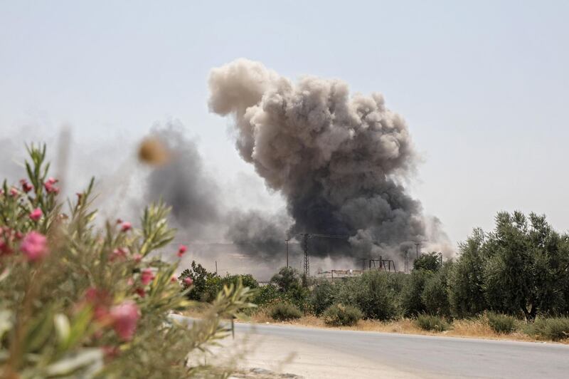 Smoke billows following following a reported regime air strike on the village of Deir Sharqi on the eastern outskirts of Maaret al-Numan in Syria's northern province of Idlib.  AFP