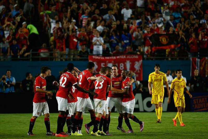 Juan Mata of Manchester United celebrates his goal with his teammates against Liverpool in the Guinness International Champions Cup 2014 Final at Sun Life Stadium on August 4, 2014 in Miami Gardens, Florida. United defeated Liverpool 3-1. Chris Trotman/Getty Images