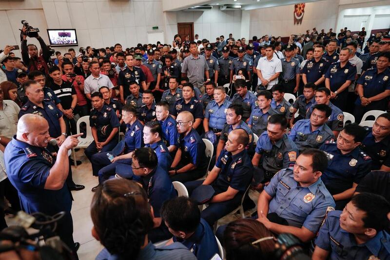 The Philippines national police chief Ronald dela Rosa speaks to police officers allegedly involved in the illegal drug trade at Camp Crame in Quezon City, north-east of Manila, on August 8, 2016. Mark R Cristino / EPA