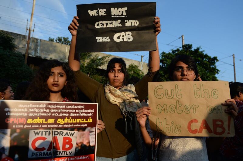 Demonstrators shout slogans and hold placards to protest against the Indian government's Citizenship Amendment Bill (CAB) in Chennai on December 16, 2019.  Fresh protests rocked India on December 16 as anger grew over new citizenship legislation slammed as anti-Muslim, after six people died in the northeast and up to 200 were injured in New Delhi. / AFP / Arun SANKAR                        

