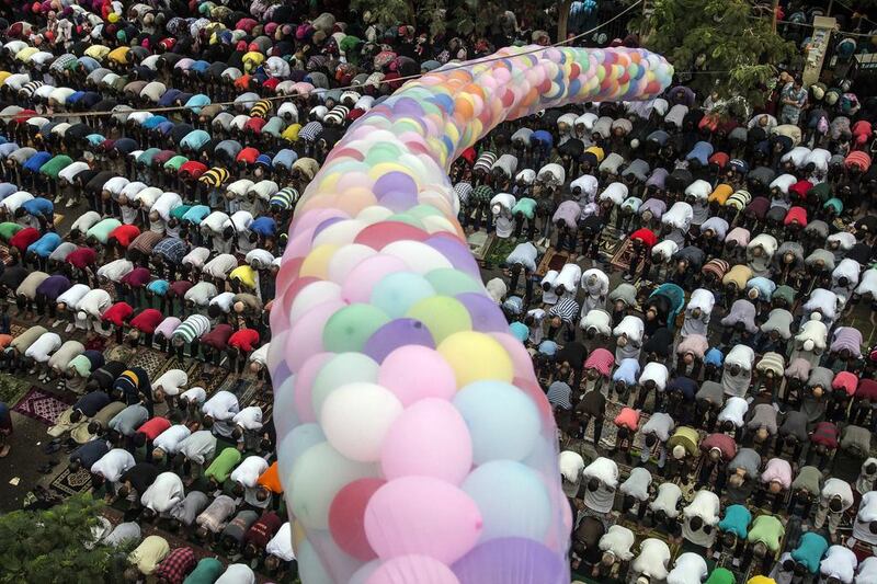 Egyptians take part in Eid Al-Adha prayers at the al-Seddik Mosque in Cairo.  Roger Anis / AP Photo